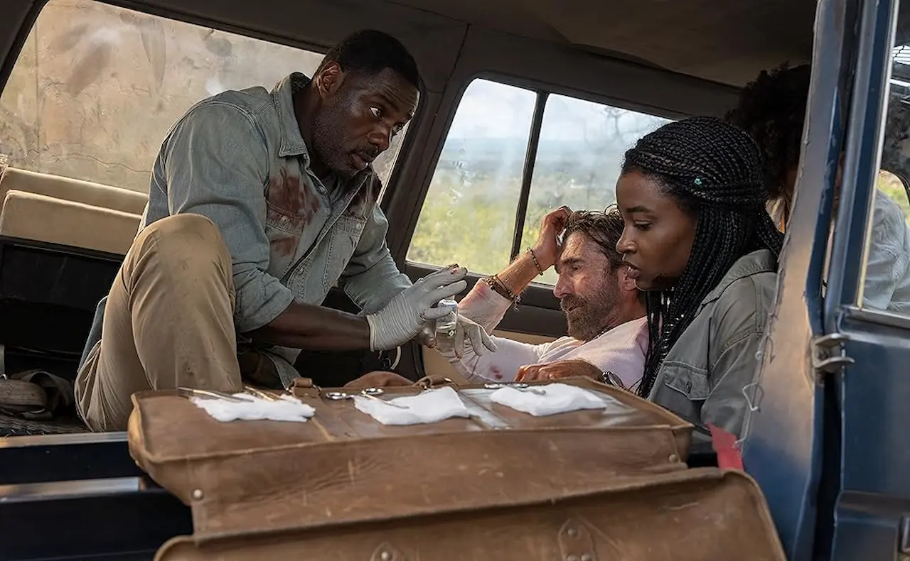 Idris Elba, Sharlto Copley e Iyana Halley in Beast