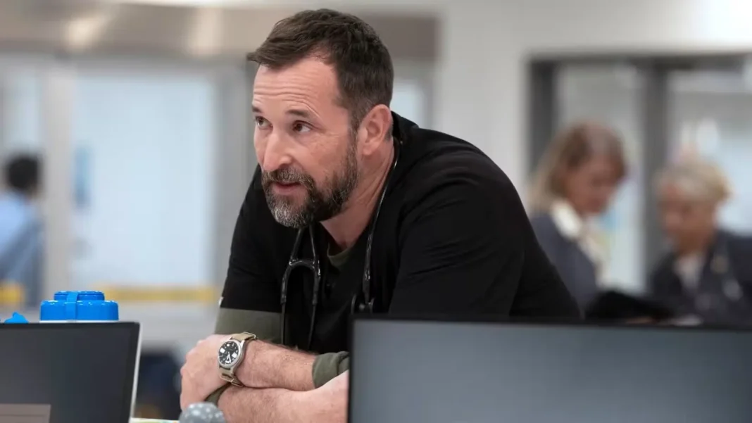 robby-leaning-over-a-desk-speaking-in-the-pitt-season-2 robby-leaning-over-a-desk-speaking-in-the-pitt-season-2