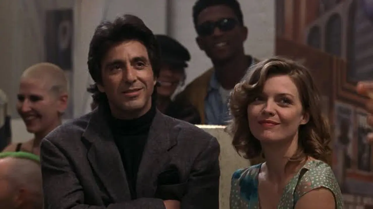Al Pacino e Michelle Pfeiffer nel film Paura d'amare